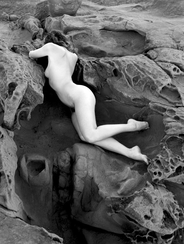 sculpted rocks figure study photo by photographer eric lowenberg