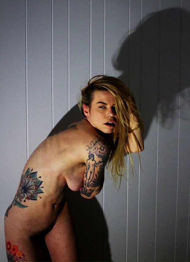 shadow casting in color tattoos artwork by photographer boudior galore