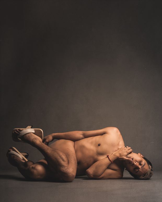 shawny on floor wearing geta artistic nude photo by photographer david clifton strawn