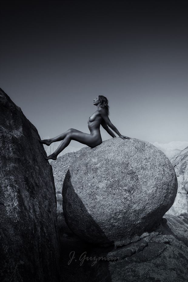 sitting on top of the world artistic nude photo by photographer j guzman