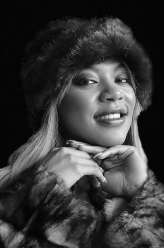 smiling girl in fur coat sensual photo by artist julian monge najera