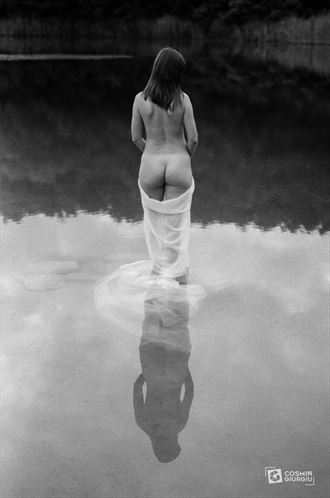 standing on water artistic nude photo by photographer cosmin giurgiu