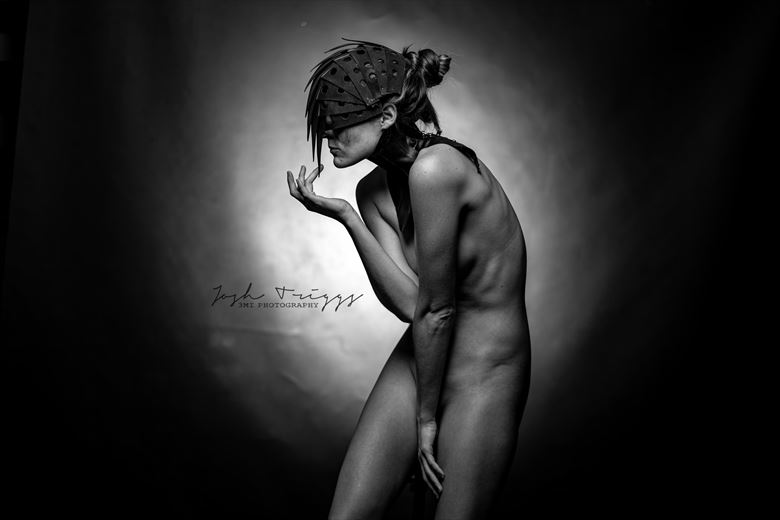 studio lighting implied nude photo by model alicia dawn