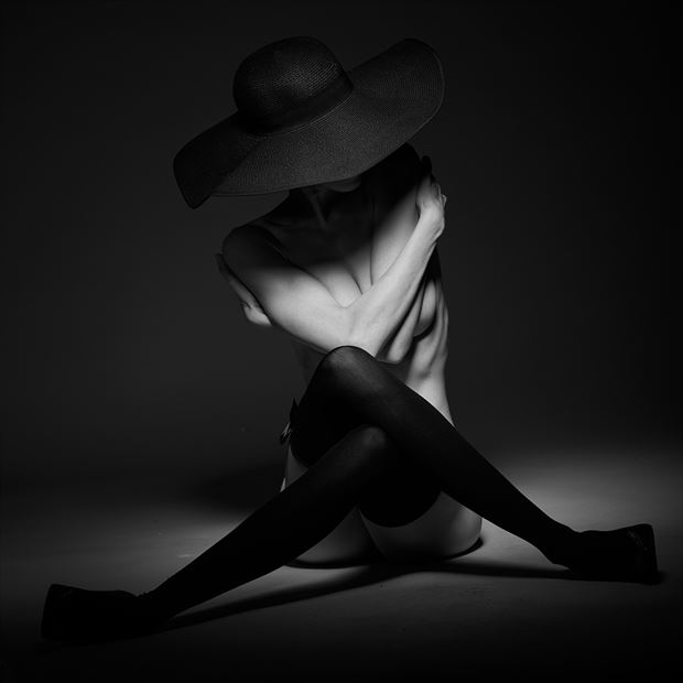 studio lighting implied nude photo by model enola
