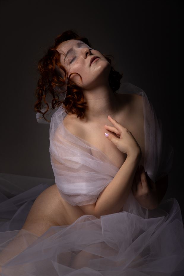 studio lighting implied nude photo by model ophelia elysian