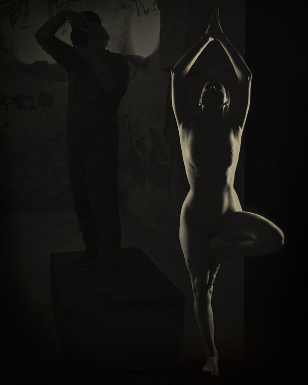 the photographer in the shadow of his model artistic nude photo by photographer henk aalberts photo