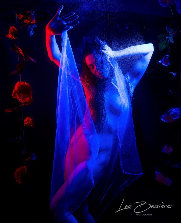 wet red and blue artistic nude photo by photographer luc bussieres