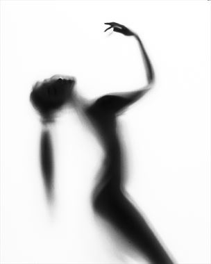 woman in silhouette artistic nude photo by model minh ly