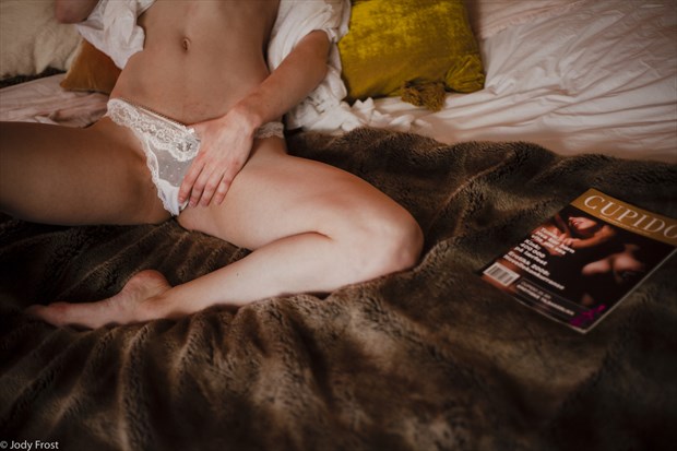 woman with adult magazine lingerie photo by photographer jody frost