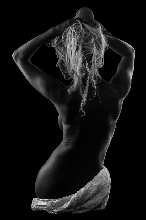 artistic nude studio lighting photo print by photographer under black light