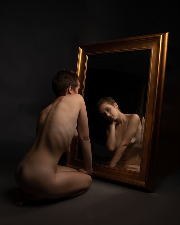 mirror gazing in isolation artistic nude photo print by photographer john dunkelberg