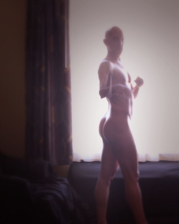 turn around artistic nude photo print by model avid light